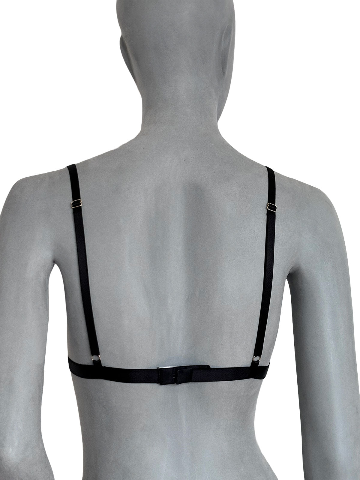 Sutiã Emma preto em tule transparente com alças finas ajustáveis e fecho traseiro, vista costas em manequim fundo neutro, lingerie sem bojo confortável design autoral Cisô Atelier